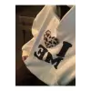 Beyaz Kore Serisi Şık Leopar Baskı Harfler