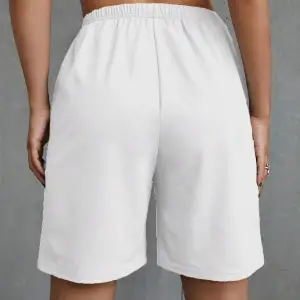 Coolane Letter Graphic Knot Front Track Şort