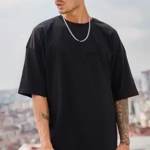 Erkek Beyaz Regular Fit Kısa Kollu Bol Kesim Pamuklu Bisiklet