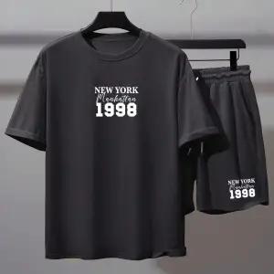 Manfinity Hypemode Erkek Bol Kesim Günlük Harf Baskılı Tişört Ve Şort Takımı