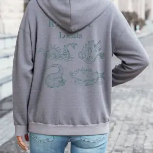 Yerliyerleri Onurlandırın Baskılı Kapüşonlu Üst Kadın Temelleri Rahat Kazak Sokak Cep Tişörtü