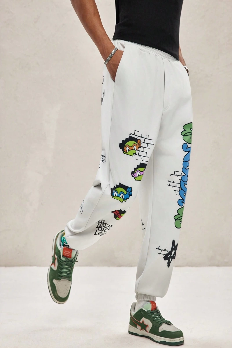 TEENAGE MUTANT NINJA TURTLES X SHEIN Erkek Rahat Bol Grafik Baskılı Beyaz Jogger Eşofman Altı