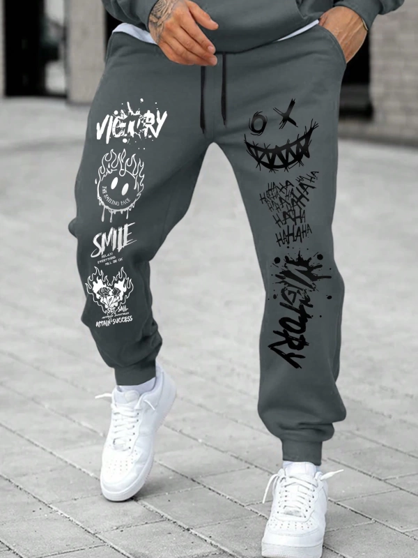 Erkek Karikatür Yüz ve Harf Baskılı Bağcıklı Jogger Pantolon