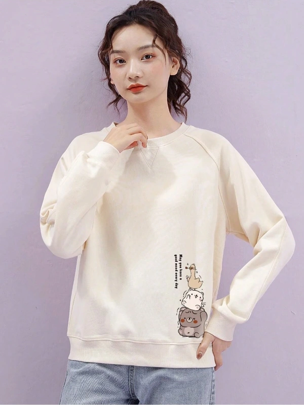 Karikatür & Slogan Grafikli Reglan Kol Sweat Bej