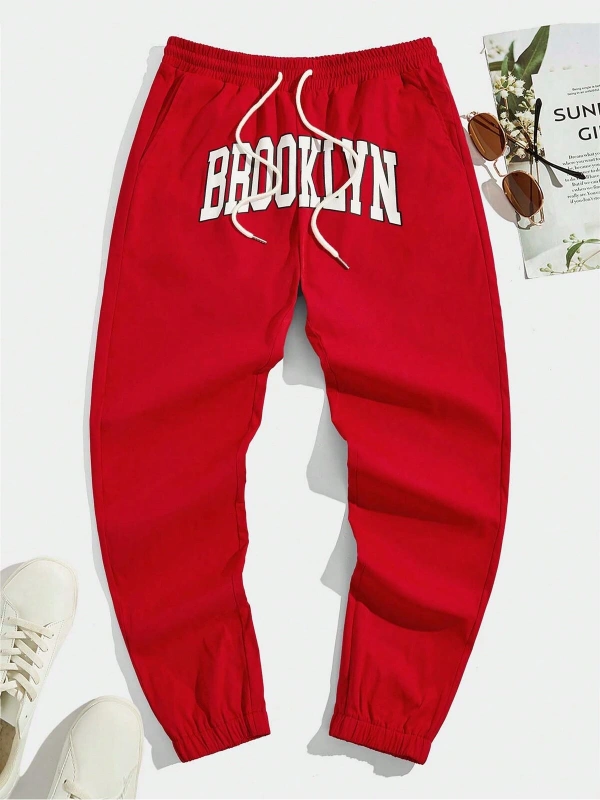 Sporsity Letter Graphic Drawstring Waist Pants