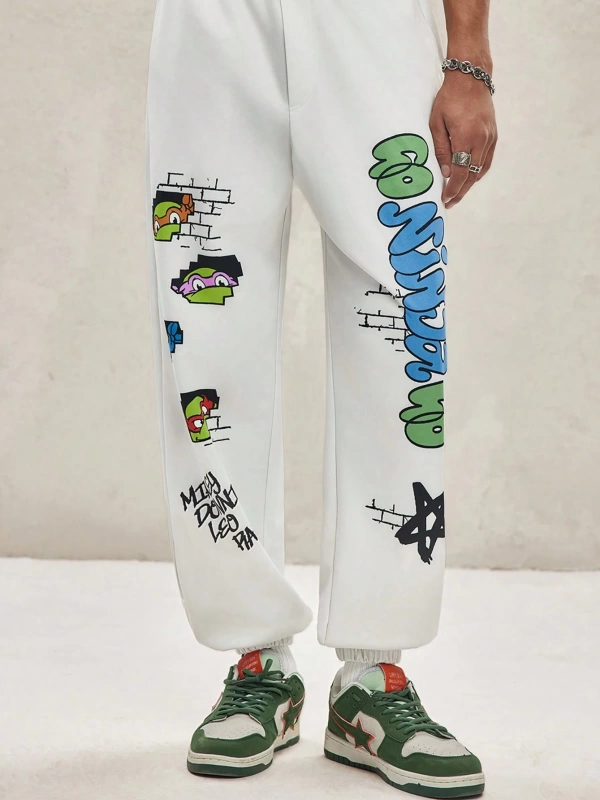 TEENAGE MUTANT NINJA TURTLES X SHEIN Erkek Rahat Bol Grafik Baskılı Beyaz Jogger Eşofman Altı