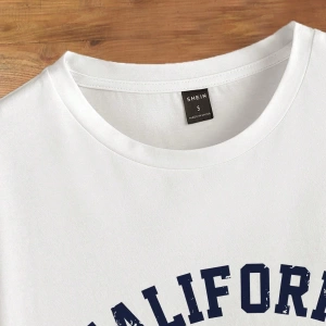Casual Minimalist Letter Print Loose Fit Yuvarlak Yaka Kısa Kollu Tişört Kadınlar İç