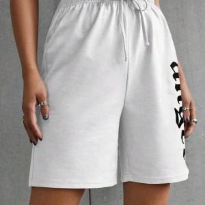 Coolane Letter Graphic Knot Front Track Şort