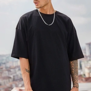 Erkek Beyaz Regular Fit Kısa Kollu Bol Kesim Pamuklu Bisiklet