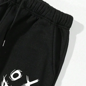 Erkek Gülen Yüz Baskılı Bağcıklı Bel Jogger Pantolon