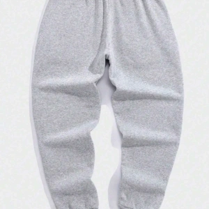 Erkek Mektup Baskı Elastik Bel ve Manşetli Etek Jogger Pantolon