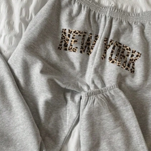 Flirla Kadın Günlük Leopar ve Harf Baskılı Uzun Bağcıklı Spor Pantolon, Sonbahar/Kış