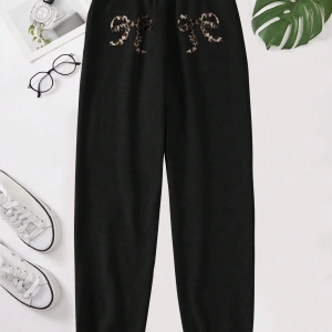 Flirla Kadın Günlük Leopar ve Harf Baskılı Uzun Bağcıklı Spor Pantolon, Sonbahar/Kış
