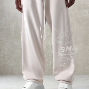 International Premium Drop Crotch Jogger Eşofman Altı Sokak Stili Tipografi Bas