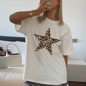 Kadın Düz Renk Yuvarlak Yaka Uzun Bol Kısa Kollu Tişört Yaz