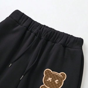 Kadın Kapşonlu Siyah Baskılı Bağcıklı Sweatshirt ve Jogger Pantolon İki Parçalı Takım