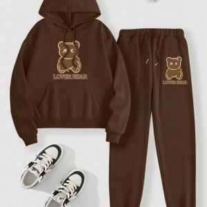 Kadın Kapşonlu Siyah Baskılı Bağcıklı Sweatshirt ve Jogger Pantolon İki Parçalı Takım