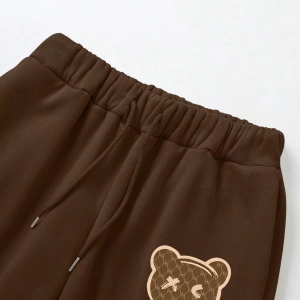 Kadın Kapşonlu Siyah Baskılı Bağcıklı Sweatshirt ve Jogger Pantolon İki Parçalı Takım