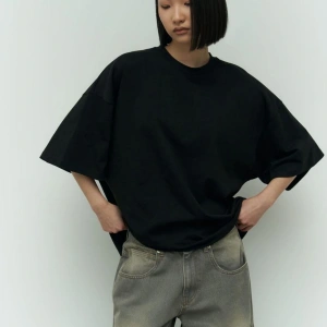 KADIN OVERSİZE NEFES ALAN BOL KESİM KISA KOLLU