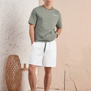 Manfinity Unisex Erkek Yuvarlak Yaka Bol Tişört ve Elastik Bel Şort Takımı