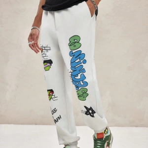TEENAGE MUTANT NINJA TURTLES X SHEIN Erkek Rahat Bol Grafik Baskılı Beyaz Jogger Eşofman Altı