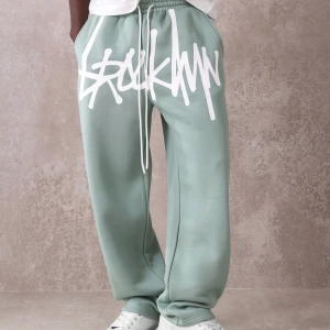 Urban Streetwear Skater Fit Eşofman Altı Graffiti Logo Baskılı, Elastik Bel Jogger Tar