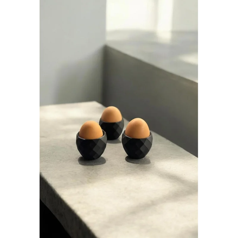 Modern desenli 3lü siyah plastik yumurtalık seti, şık ve kullanışlı.