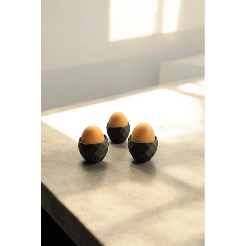 Modern desenli 3lü siyah plastik yumurtalık seti, şık ve kullanışlı.