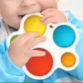 Bebek Diş Kaşıyıcı ve silikon stres topu oyunu  ikisi bir arada