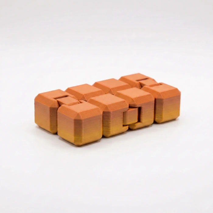 Premium İpek Dokulu Sonsuzluk Küpü (Infinity Cube) - Stres Giderici & Odaklanma Oyuncağı - Bakır/Altın Geçişli