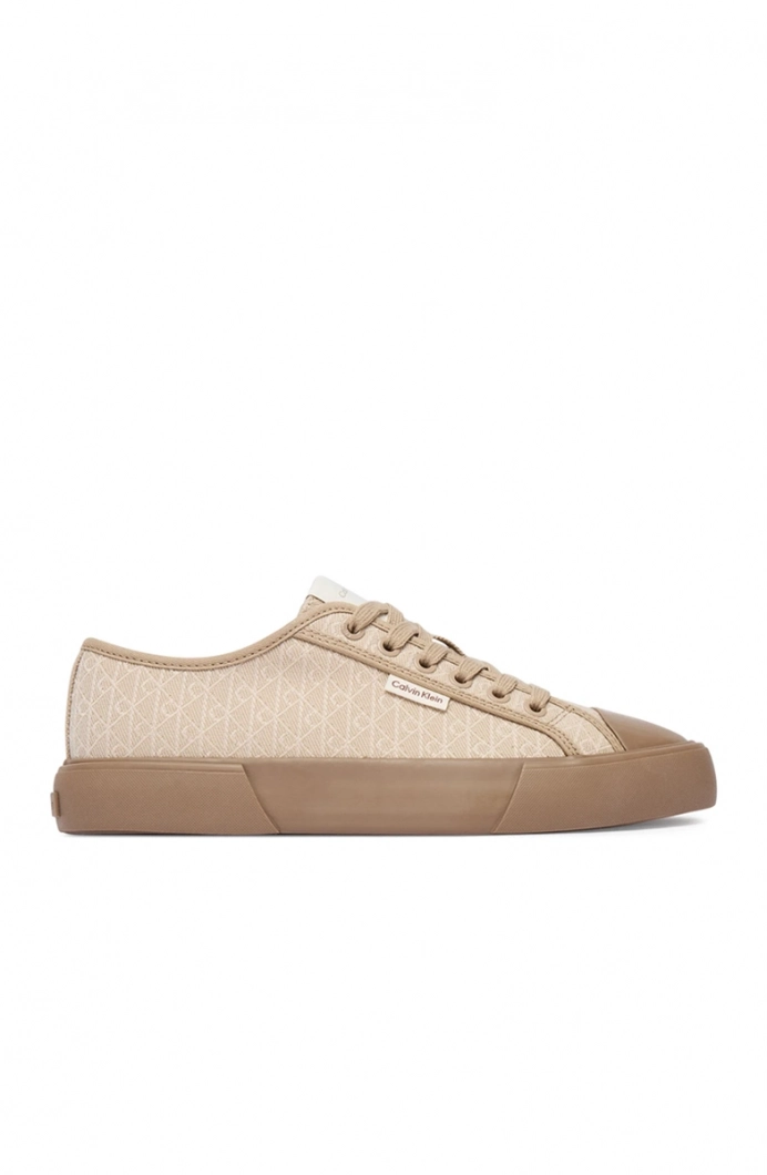 Calvin Klein Vulkanize Düşük Bilekli Bağcıklı Tamamı Baskılı Kanvas Kadın Bej Sneaker HW0HW03142-A04