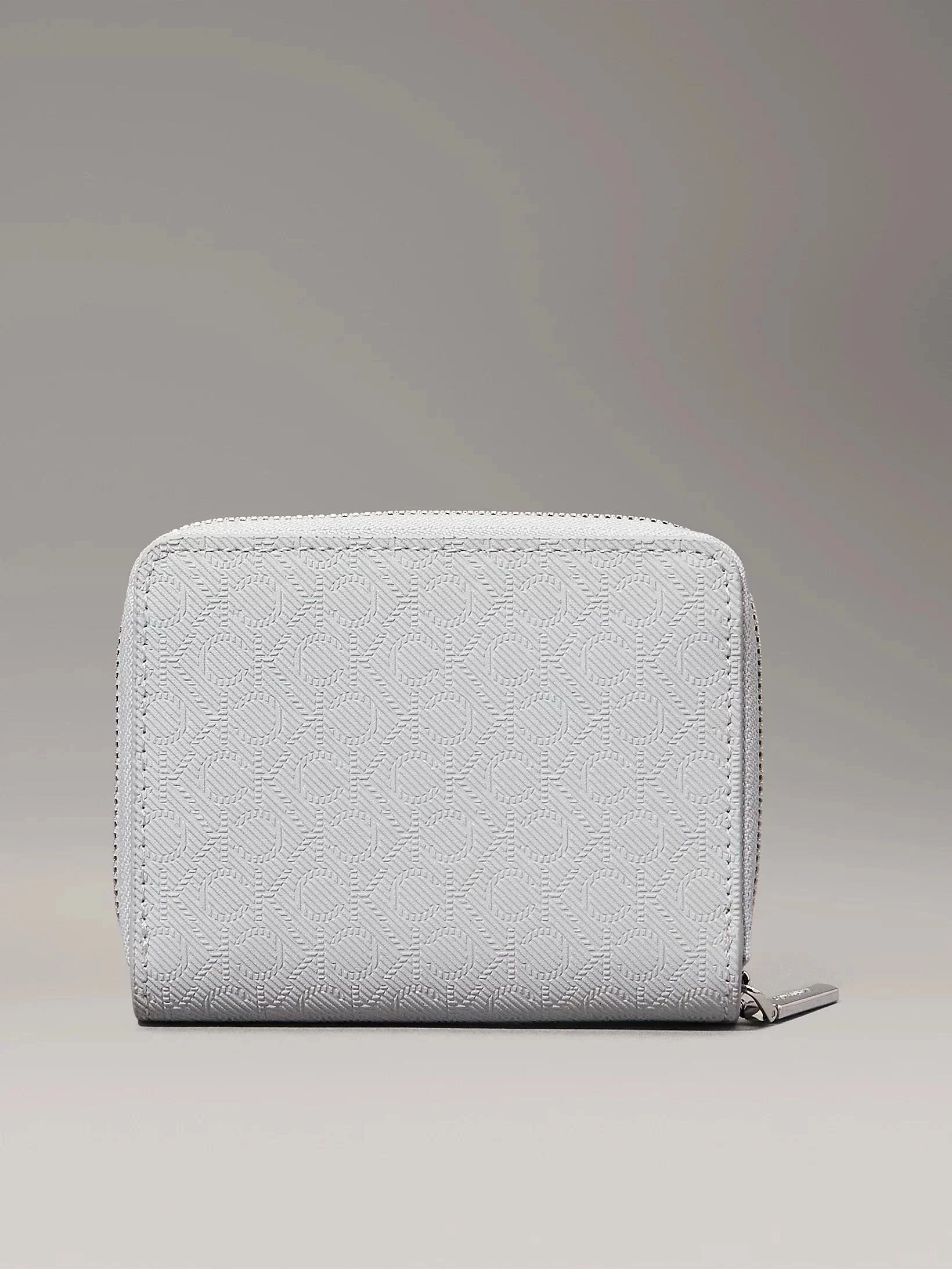CK MUST MEDIUM ZIP AROUND_MONO