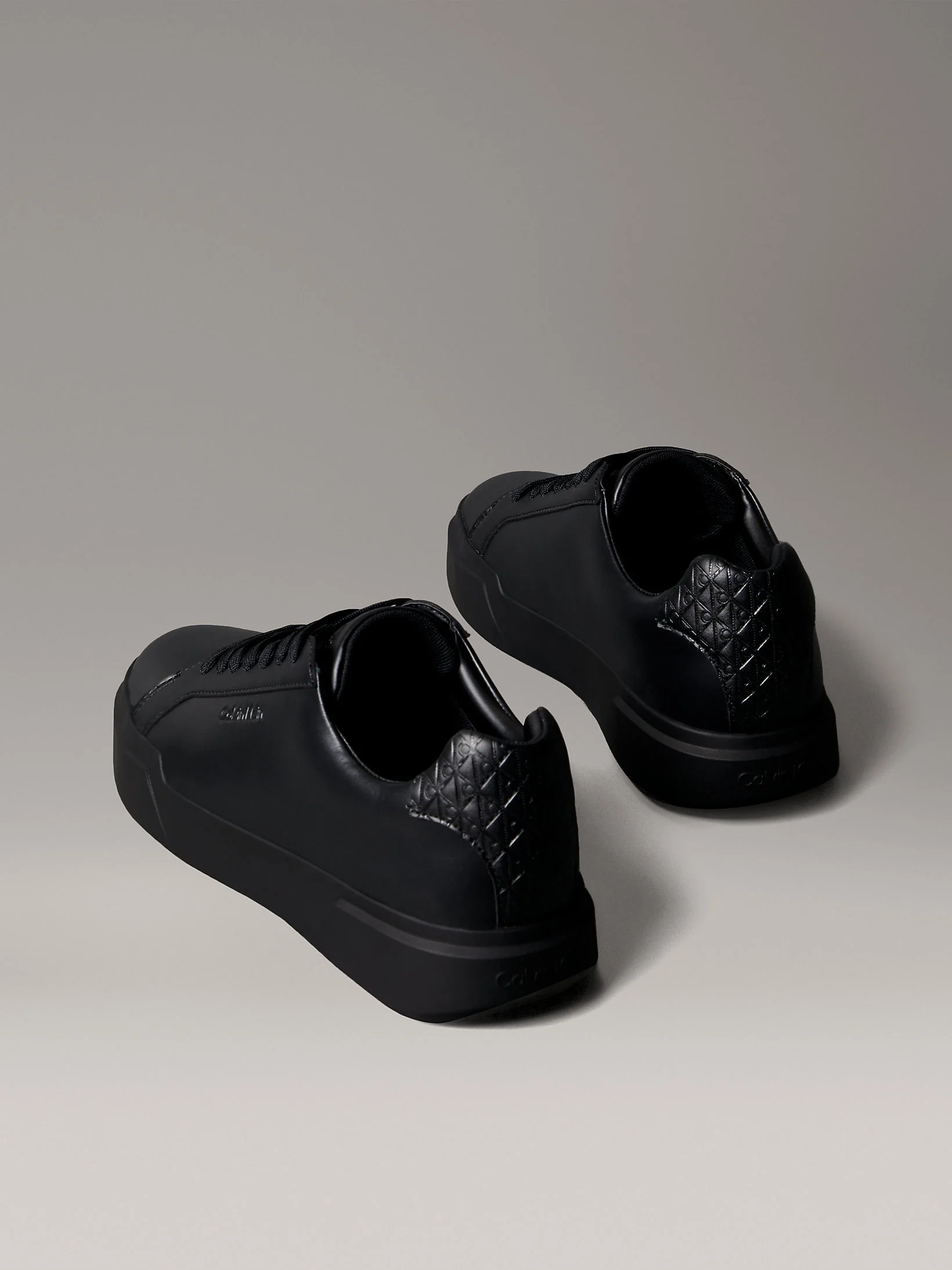 Calvin Klein Chunky Cupsole Bağcıklı Deri Tamamı Baskılı Erkek Siyah Sneaker HM0HM02070-0GJ