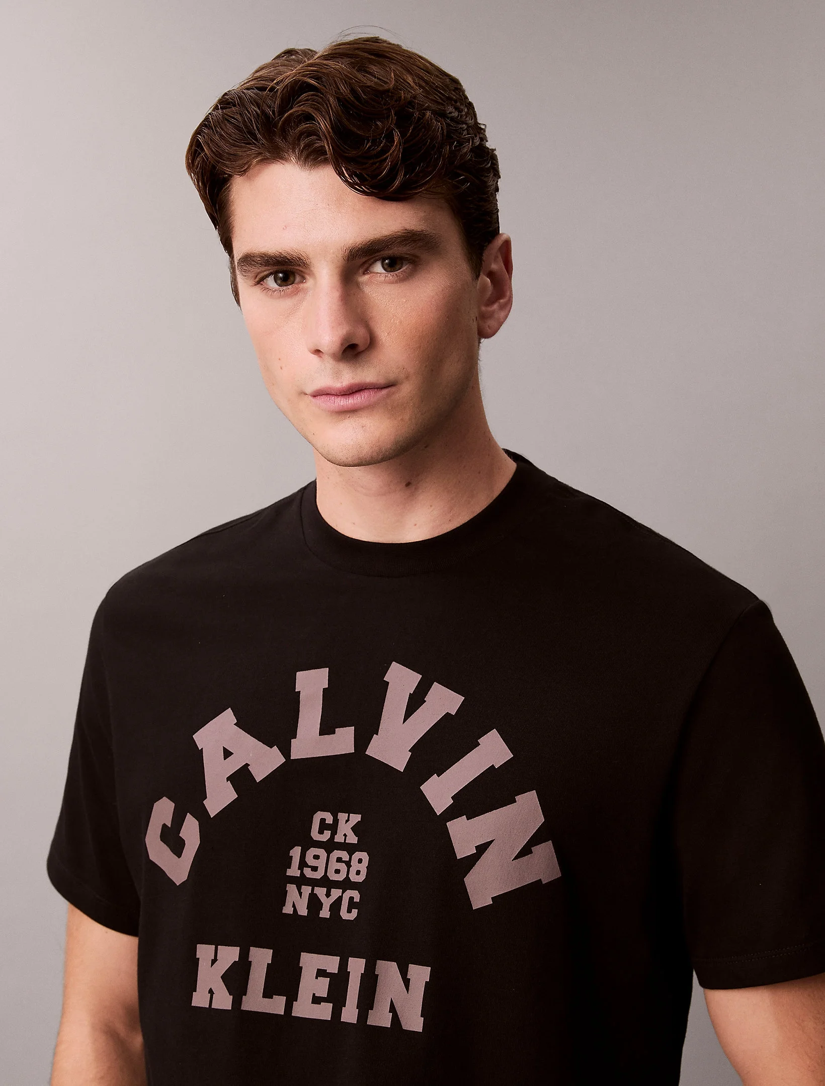 Calvin Klein Kısa Kollu 20s LN Calvin College Grafik Baskılı Erkek Siyah T-shirt LV04RE810G-UB1