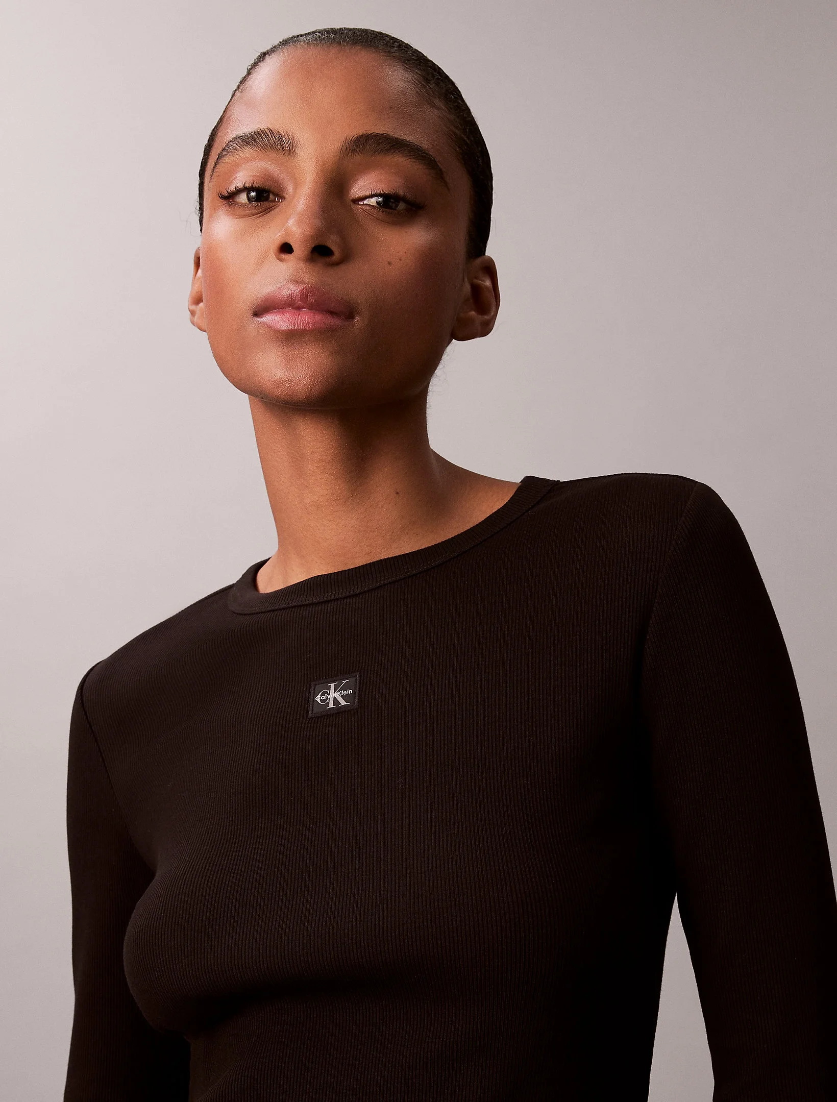 Calvin Klein Uzun Kollu Dokuma Etiketli 2x2 Fitilli Bisiklet Yaka Kadın Siyah Bluz LV047E205G-UB1