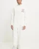 Tommy Jeans TJM 1/4 ZIP TOWEL PATCH POLO Erkek beyaz Sweatshirt DM0DM21263YAC