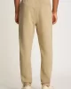Tommy Jeans TJM REG BADGE SWEATPANT Erkek BEJ Eşofman Altı DM0DM20276ACT