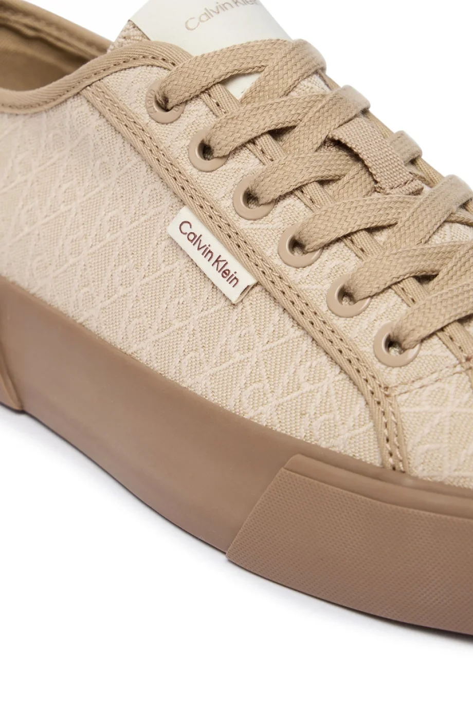 Calvin Klein Vulkanize Düşük Bilekli Bağcıklı Tamamı Baskılı Kanvas Kadın Bej Sneaker HW0HW03142-A04