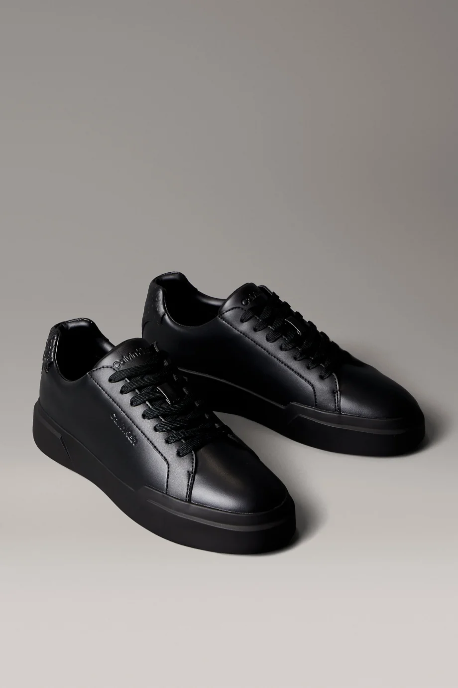 Calvin Klein Chunky Cupsole Bağcıklı Deri Tamamı Baskılı Erkek Siyah Sneaker HM0HM02070-0GJ