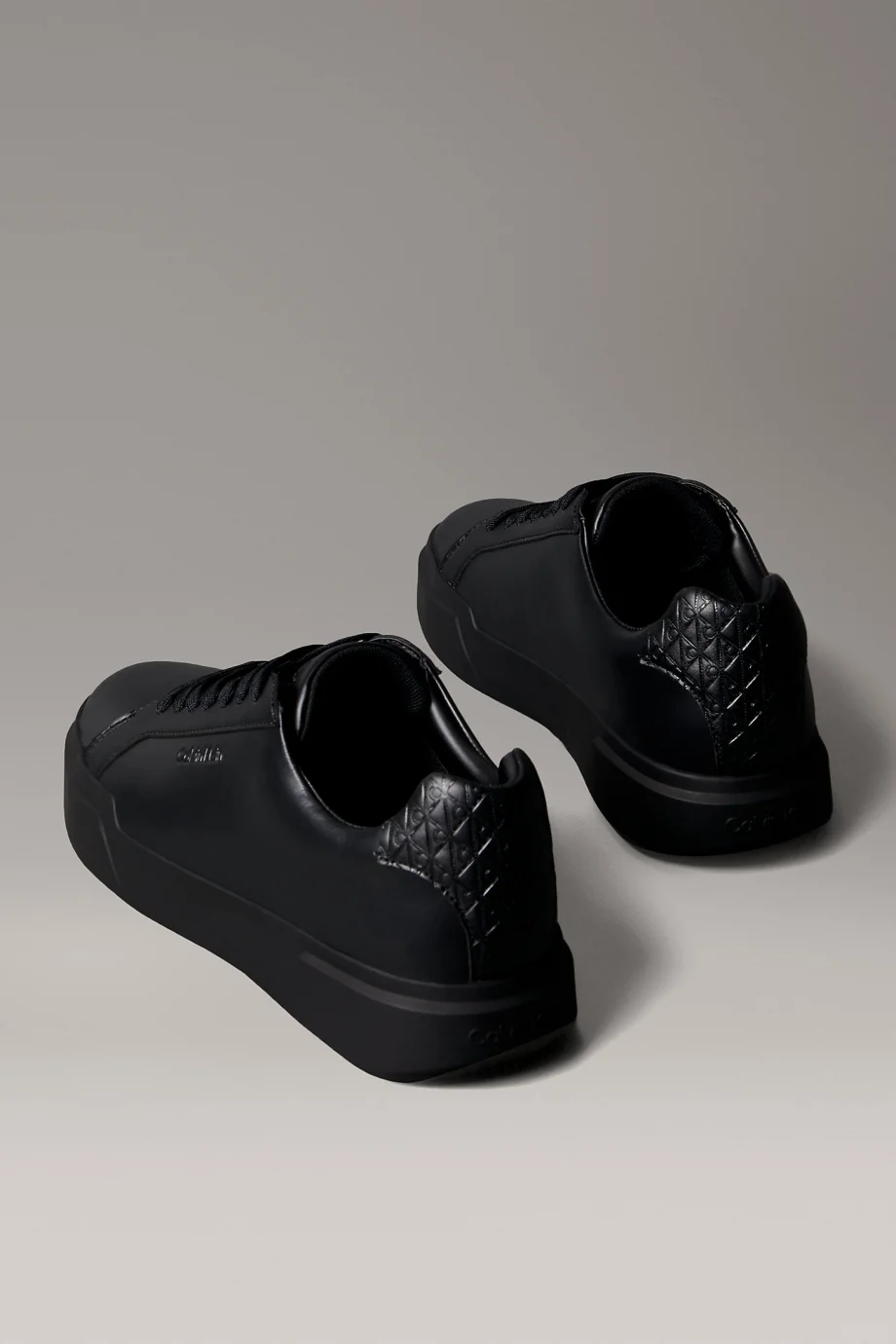 Calvin Klein Chunky Cupsole Bağcıklı Deri Tamamı Baskılı Erkek Siyah Sneaker HM0HM02070-0GJ