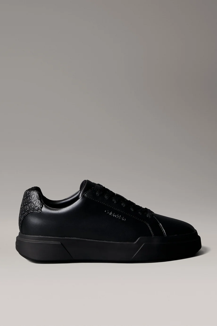 Calvin Klein Chunky Cupsole Bağcıklı Deri Tamamı Baskılı Erkek Siyah Sneaker HM0HM02070-0GJ