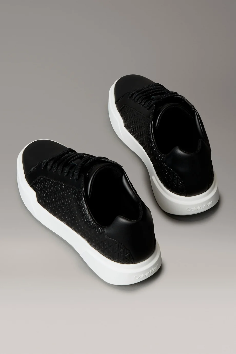 Calvin Klein Chunky Cupsole Bağcıklı Deri Tamamı Baskılı Erkek Siyah Sneaker YM0YM01383-BEH