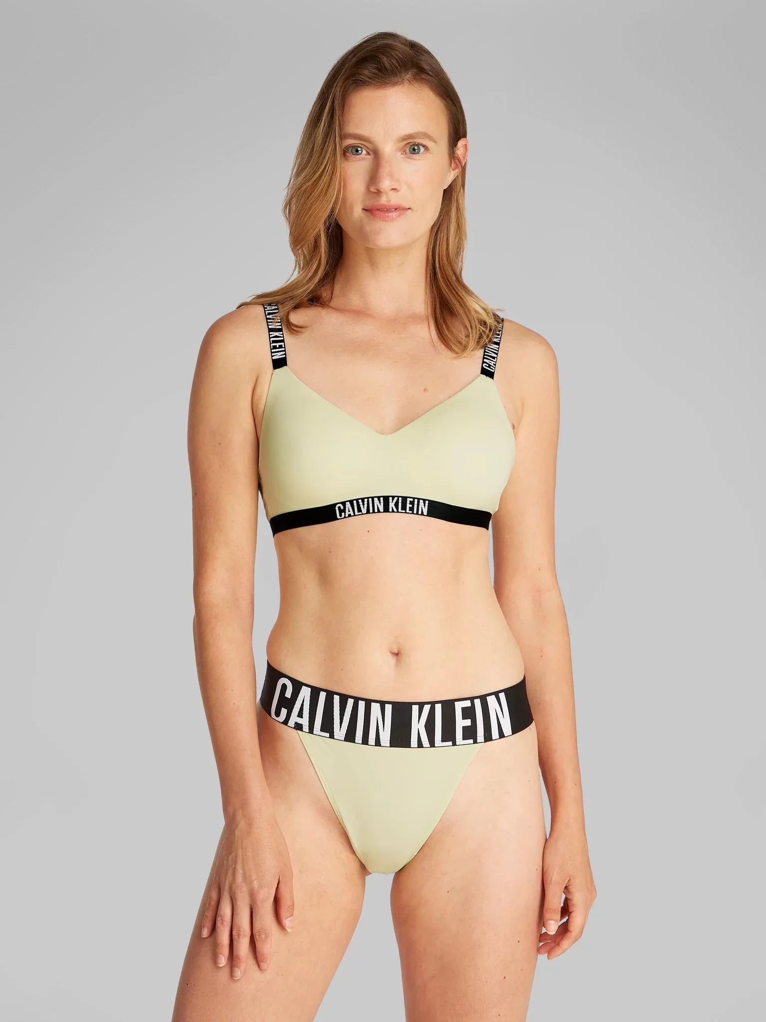 Calvin Klein LGHTLY LINED BRALETTE Kadın  Büstiyer 000QF7659E-FUO