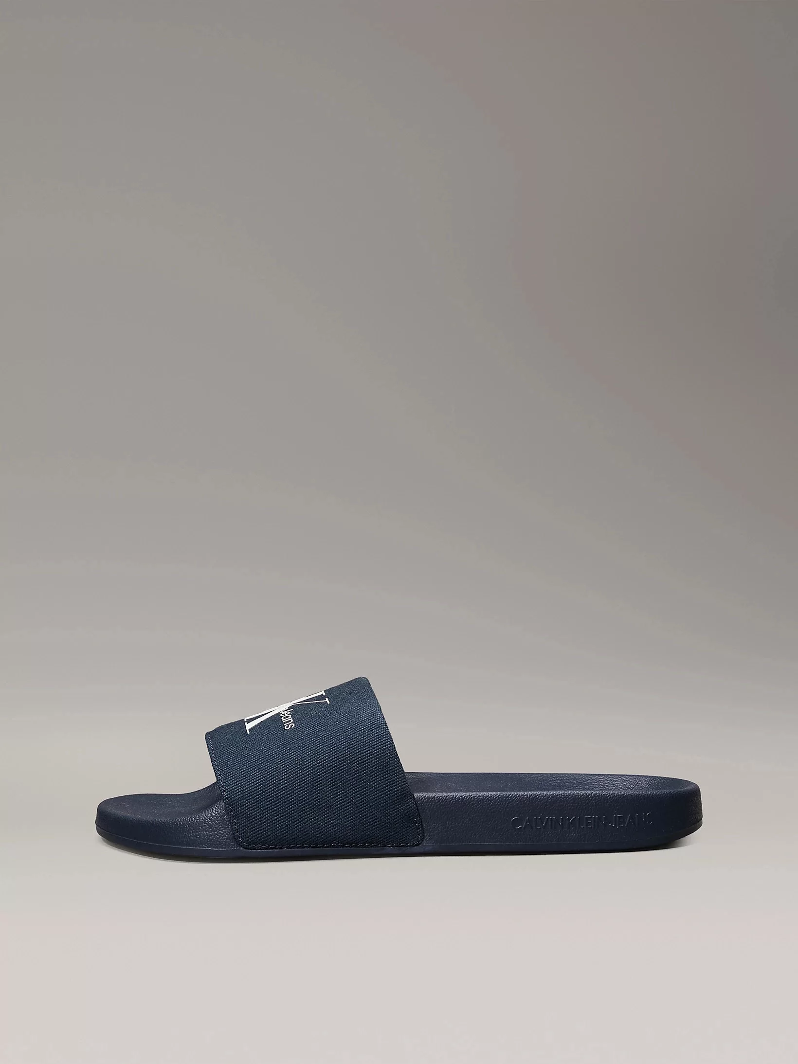 Calvin Klein SLIDE MONOGRAM CV Erkek  Terlik YM0YM01271-DW4
