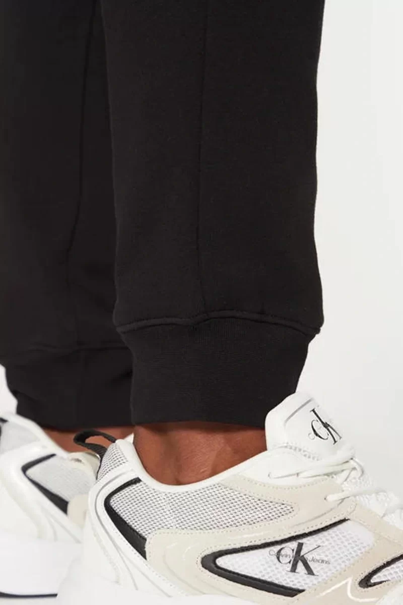 Calvin Klein SPLIT LINE LOGO JOGGER Erkek  Eşofman Altı K10K114342-BEH