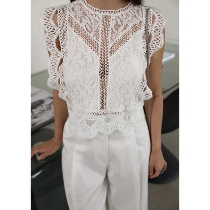 GÜPÜRLÜ SIRT FERMUARLI BLUZ