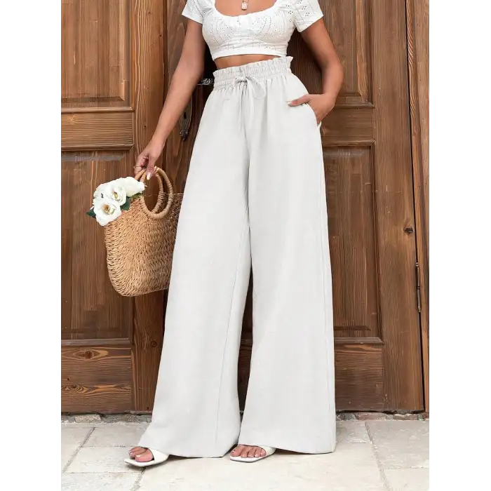 Keten bağcıklı beyaz pantolon