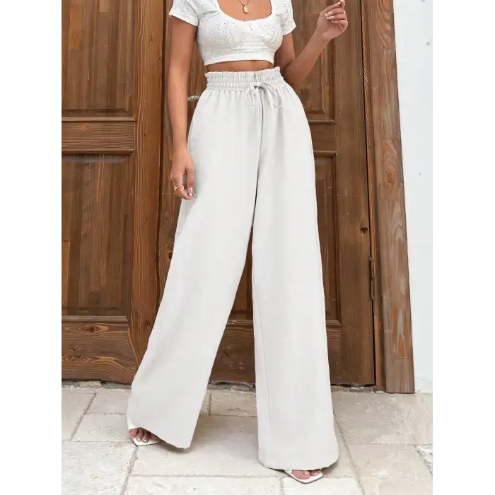 Keten bağcıklı beyaz pantolon