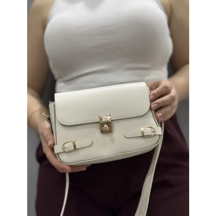 Zerej kemerli krem cilt çanta