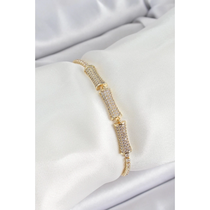 Pirinç Gold Renk Zirkon Taşlı Kemik Model Kadın Bileklik